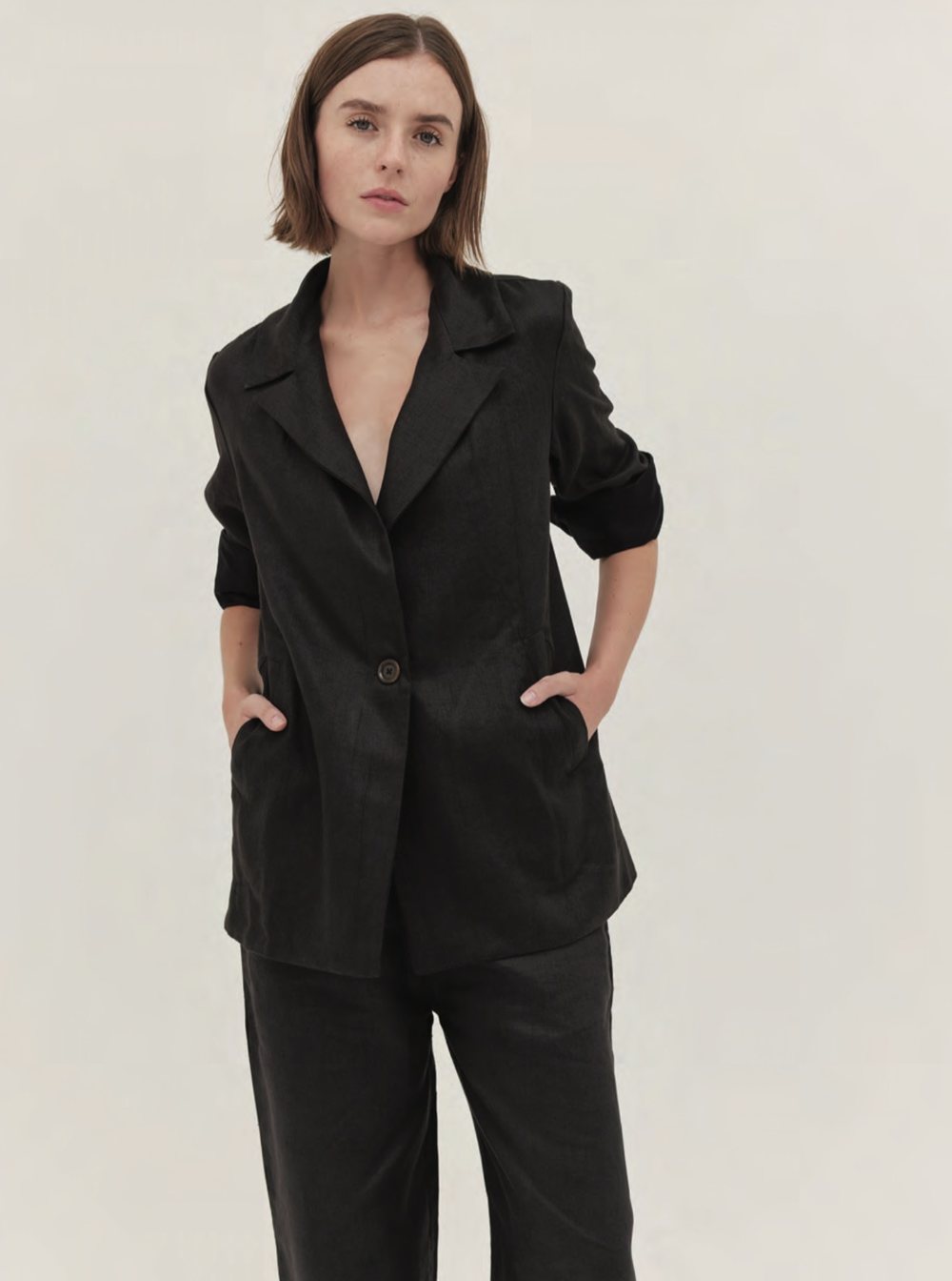 Tailored black blazer and trousers