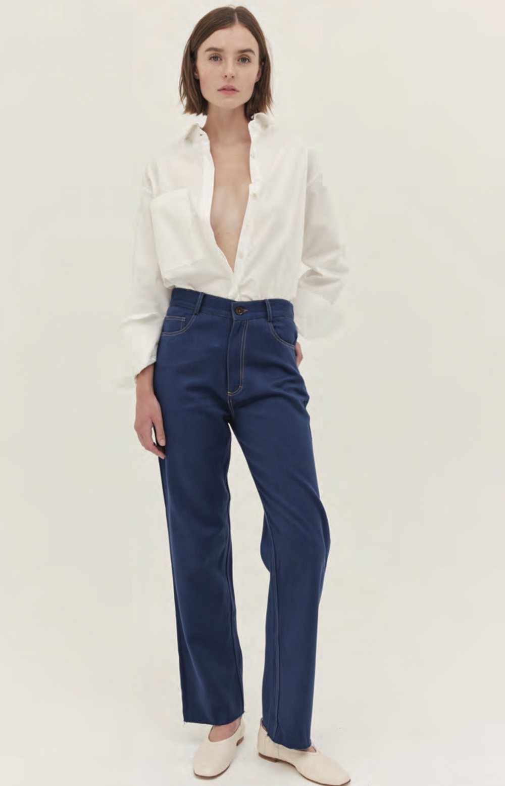 White shirt worn with straight-leg denim