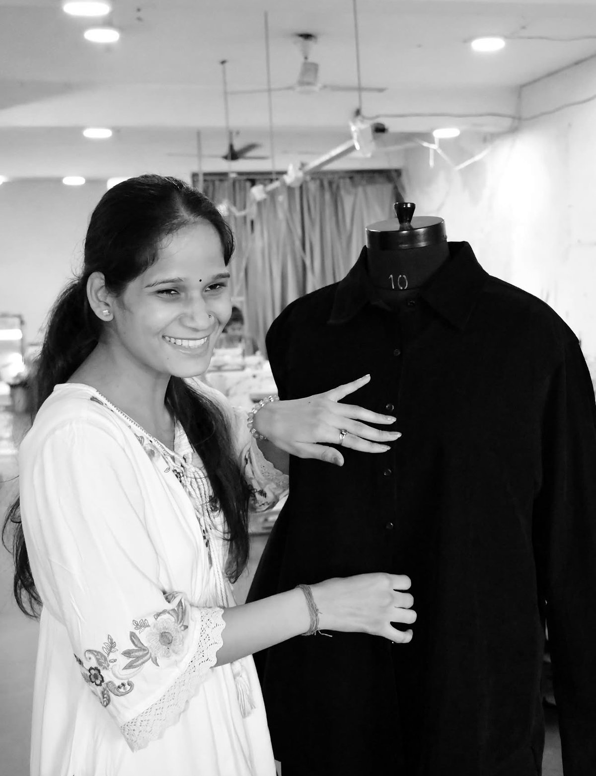 Checking a finished garment on the form
